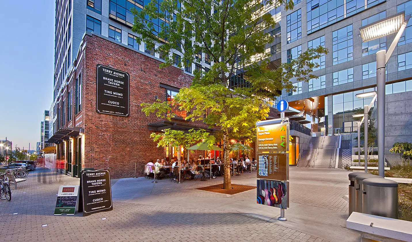 AMZN Terry Ave Bldg S070009 03 03 C070009 02 03 N19 Dusk Plaza Activated Restaurant Open Staircase