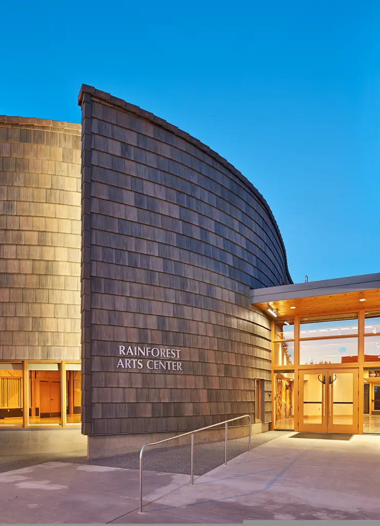 Rainforest Arts Ctr Partial Curved Wall Exterior Dusk S130030 08 N16